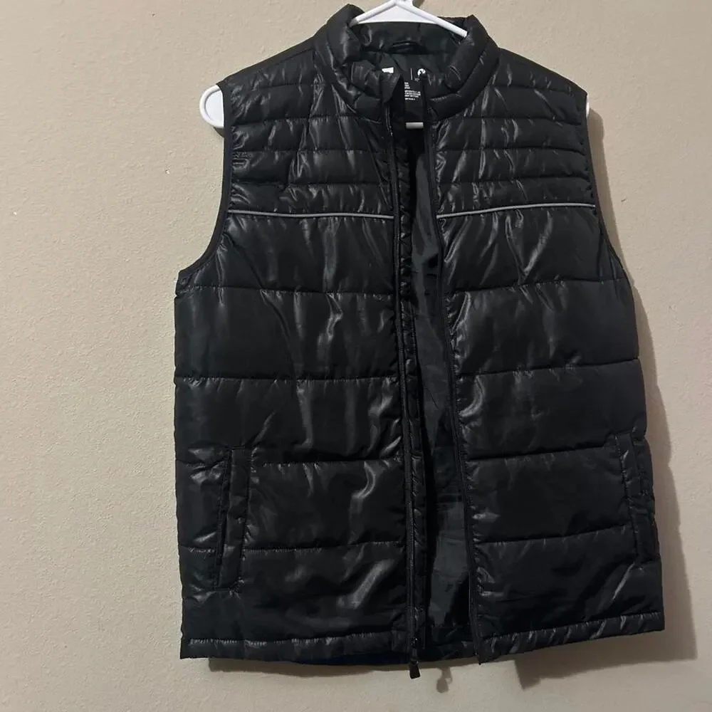 Black puffer vest with horizontal